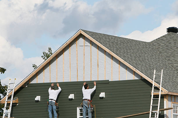 Professional Siding technician working in Worton, MD